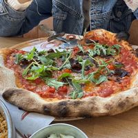 Vegan pizza with rocket, caramelised onion and roquito peppers  at Orto - Bedford House in Belfast