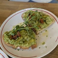 Tosta de aguacate 9€ at La Gente Café in Oviedo