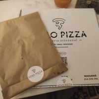 Pizza and garlic bread at  Solo Pizza in Maia