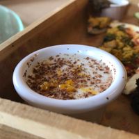 Vegan high tea set coconut panna cotta with coconut chocolate shavings at Well Dressed Salad Bar and Cafe in Central Singapore