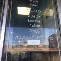 Advertising their vegan options on the storefront  at Eco Eats in Key Largo