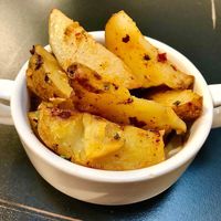 Spiced roasted potatoes  at Olive Tree Restaurant in Dubai