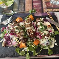Turkish kebabs on a delicious mixed salad.  at All Good Things Vegan in Paignton