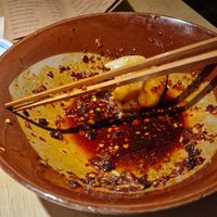 Has been "Dumplings with Chili Oil" at chaochao. vegan food and natural wine bar in Beijing