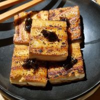 Miso Tofu: To be honest, I found it a bit bland for my taste. I ended up mixing it with the leftover sauce from the Xiang Xiang tofu, and then it was delicious. at chaochao. vegan food and natural wine bar in Beijing