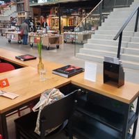 Cafe in library in former train repair warehouse at StadsCafé LocHal in Tilburg