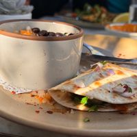 MUSHROOM QUESADILLA 
mozzarella, roasted garlic mushroom, spinach, and guacamole at Gracias Madre - WeHo in West Hollywood
