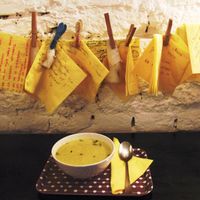 Interior detail and Vietnamese vegan soup - cocoa milk,mushrooms,carrots,potatoes and sprouts  at Supa Star in Sofia