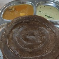 Ragi dosa (finger millet) with sambar and chutney at Prakruthi Eco World in Fort Kochi