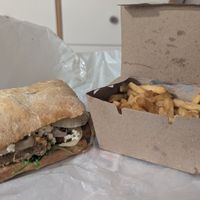 Milanesa fugazzetta con papas fritas ($7200) at Mila y Vos in Buenos Aires