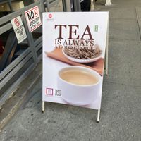 Placard in front at JIN YUN FU Tea Shop in New York City