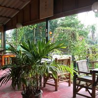 Green Gallery has open walls, like most restaurants in the area.   at Green Gallery in Koh Phangan
