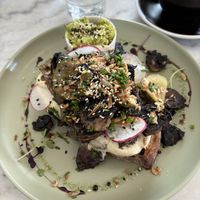 Magic Mushrooms with toasted sourdough, portobello mushrooms, house made cashew cheese and crispy shallots with side of smashed avo .  at The Farmhouse  in Clevedon