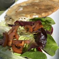 Sausage, mushroom and cheese crepe   at Delicious   in Harrogate