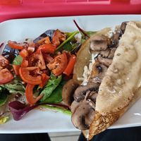Sausage, mushroom and cheese savoury crepe at Delicious   in Harrogate