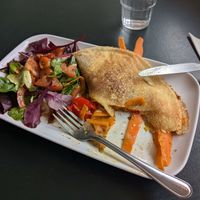 Curried carrots, peppers and vegan cheese savoury crepe. at Delicious   in Harrogate