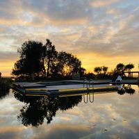 View from outside seating (at sunset) at A Tenda da Reserva  in Santiago Do Cacem
