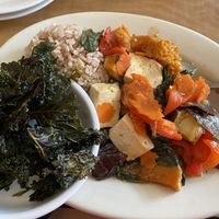 PET curry with tofu and kale chip sides  at Red Curry Vegan Kitchen in Flagstaff