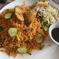 Jollof Rice 🍚   at Loving Hut Vegan Diner - Lapaz in Accra