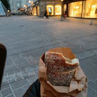 Chimney Cake with a bite out of it at Speisekammer Goldgasse in Salzburg