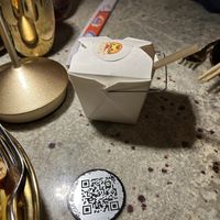 Cocktail in a take out box  at Laut in New York City