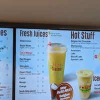 Plant based items are marked by the leaf symbol. Fresh Juices and Hot Stuff menu. (Taken 2024-02-15) at Juice Dudez in Ottawa