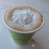 Biscoff Latte. It's not naturally vegan but if you ask for oat milk and coconut whip it is vegan. at Juice Dudez in Ottawa
