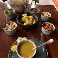 Potatoes & combination of side saladss  at Osturi - اسطوري in Al Ula