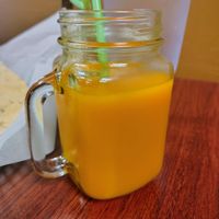 Mango juice at Nanglo Momos & Curry in Appleton