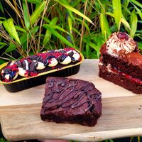 Custom Cake, Black Forest Slice, and Fudgy Brownie. at Bel's Vegan Bakes - Pop-Up in Bangor