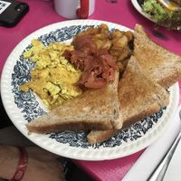 Scrambled tofu with bacon, fried potatoes and toast  at Mamalicious in Hamburg