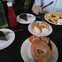 all vegan: 
Cheese-Avocado-Tomato Bagel
Greek Salad
Chocolat Brownie Cake at Mamalicious in Hamburg