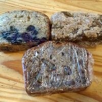 Banana walnut bread, blueberry almond bread, and pumpkin crumble bread.  at The Sentient Bean in Savannah