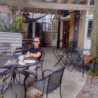 Seating is available on the 
 back patio (photo) and on the front sidewalk at The Sentient Bean in Savannah