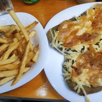 Milanesas como pizza a la fugazza. at RELICIOSO in Buenos Aires