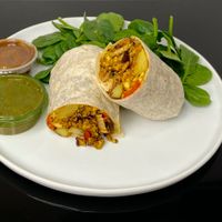 breakfast burrito + spinach side salad (plated at home) at Ada's Technical Books and Cafe in Seattle