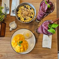 smoothie bowl, mango sticky rice, blueberry shake at D'oasis Cafe' at Railay Beach in Krabi