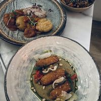 Broad bean croquettes, sticky tofu, and tomato gnocchi  at Kin Restaurant in London