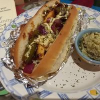 Vegan philly cheesesteak with tofu, peppers, onions, vegan cheese. With fun-size vegan potato salad. at Community Cafe in St Petersburg
