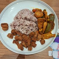 Tofu curry stir fry and crispy pork at So Vegan - Bang Kapi in Bangkok