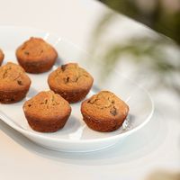 Vegan and gluten-free chocolate chip banana muffins, with no artificial flavors or refined sugars.  at Curiosa | Cafe & Juice Bar in Mexico City