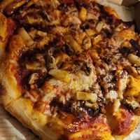 Pizza with daiya cheese, pineapple, mushroom, spicy vegan chorizo & balsamic glaze at Blaze Pizza in Royal Oak