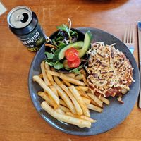 No chicken parmigiana with chips and salad and vegan cheese at Miners Gold Brewery in Beaconsfield