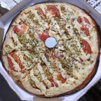 ''Da casa'' pizza, from the delivery service. at LAR vegan in Sao Paulo