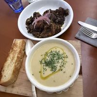 Bread no vegan - gave that to my dad! 😉. Other food was delicious!  Leak soup and Brussels sprouts.  at Mother in Sacramento