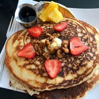 HUGE pancakes at Sunday brunch. As good as they look!!  at Higher Taste Plant Based in Long Beach