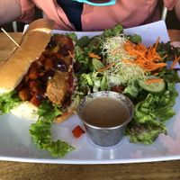 Pizza Dog with side salad at Higher Taste Plant Based in Long Beach