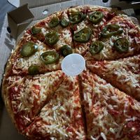 Vegan half and half pizzaa  at Pizza Pizza in Banff