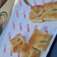 A plate of foccacia at AloPanCafe  in Milan