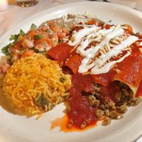 Enchiladas with vegan beef, cheese, sour cream, beans, salsa Fresca, and rice  at La Cantina in Chicago